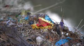Floods leave river festooned with rubbish and looking like 'Third World country'