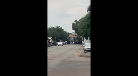 Mining Trucks Stop Traffic