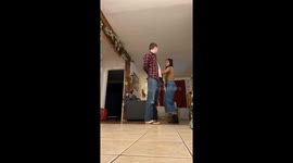 Cat Interrupts Couple's Dancing