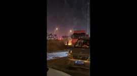 Firefighters put out blaze on bridge and guard residents setting New Year fireworks