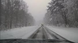 Daredevil Driver Narrowly Escapes Icy Peril on Snow-Laden Roads in Pelham, MA, USA