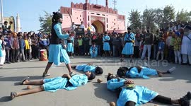 Martial arts and sword fighting combined for fearsome display during Sikh festival in northern India