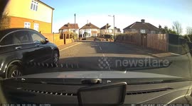 A driver cuts a corner in from of a learner on a driving test and the learner fails as examiner has to push brakes