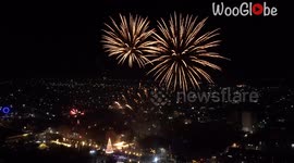 Tokmok's night sky painted with a fiery ballet of New Year's fireworks