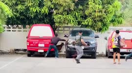 Runaway goat rampages in front of post office in Thailand