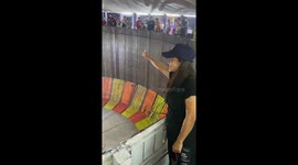 Wall of Death stunt rider collects tips from crowd