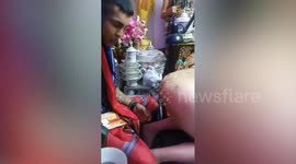 Thai black magic doctor sparks outrage licking followers' bottoms in bizarre blessing ritual
