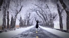 China: Graceful Dance Performance In Snowy Scene In Changji, Xinjiang