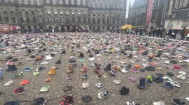 Thousands of shoes symbolising children killed in Gaza placed in main square in Amsterdam,