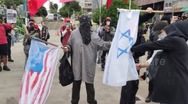 Protesters set the Israeli and US flags on fire in Sao Paulo, Brazil