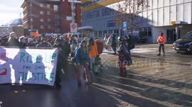 Anti WEF protesters at Davos, Switzerland before WEF's 2024 meeting.