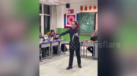 Math teacher shows off nunchaku performance to pupils