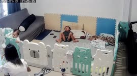 Toddler saves baby sister when her head is stuck in playpen gap