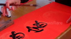 Calligraphy Enthusiast Writes Spring Festival Couplets For Villagers in Yichang, China