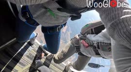Friends skydiving together hit each other in the air on exit