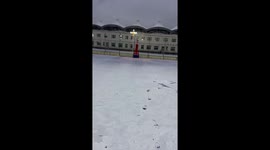 Chinese man slips on ice when he tries to pose in front of camera