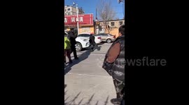 Chinese woman arrested for intentionally striking and running over husband