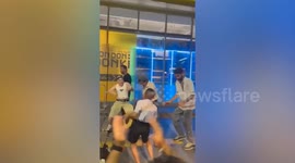 Footpath busking band entertain foreigners in Bangkok