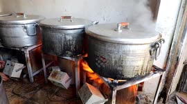 Palestinians Queue for Essential Food Aid in Khan Yunis