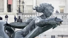 Fountains freeze  in London’s Trafalgar Square as temperatures plunge