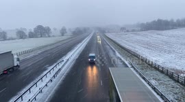 Drivers brave heavy blizzard on the M74 motorway near Moffat Scotland UK