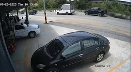 Pickup truck crashes into car and sends it hurtling towards shop