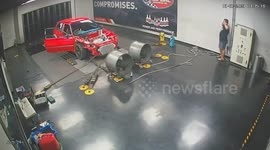 Tire explodes in car repair shop in Thailand