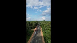 drone footage elephant stop the car on the road  sri lanka
