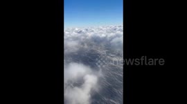 Unique weather phenomenon sees vapour rise from Lake Michigan's surface