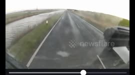 Hero lorry driver saves motorist whose car plunged into freezing water-filled ditch