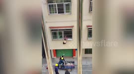 Boy with head stuck in widow grille rescued in China
