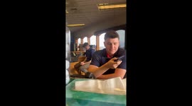 Man pranks coworker by pretending to be mean to a customer