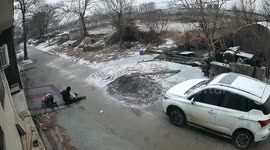 Chinese family's epic synchronised slip on icy steps sparks laughter in a chilling mishap