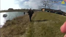 Illinois police officers leap into pond to rescue family trapped in submerged car