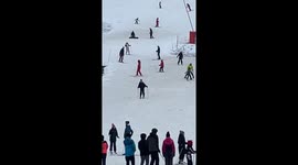 Skier Faceplants at the Bottom of the Slope