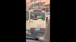 Chinese girl displays award on three-wheeler's back window, mesmerising onlookers