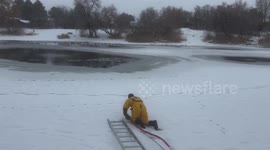 Firefighter rescues dog from frozen lake in Utah