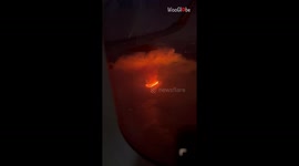 Erupting volcano welcomes flight passengers with a FIERY display *UNREAL Aerial View!*
