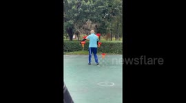 Master of Diabolo Showcases Impressive Acrobatic Skills in Meishan, China