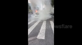 China: Passerby Rescues Driver Trapped In Burning Vehicle In Nanjing