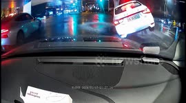 Car gets lifted by bursting manhole cover in middle of road in China