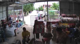 Motorcycle sidecar topples over as woman rides into garage