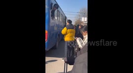 Unconventional Bus Boarding Practices Displayed with Determination in Shandong, China