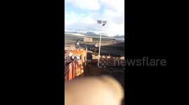 Man narrowly escapes bear attack by climbing over truck in China