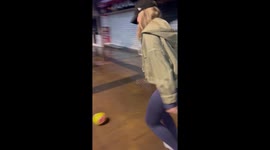 Unintended slam: playful football mishap shatters phone in Malaga