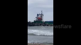 Panamanian cargo ship stranded off beach in Japan