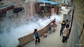 Elderly Chinese villager's smoke-shrouded tractor journey transforms streets into mystical wonderland