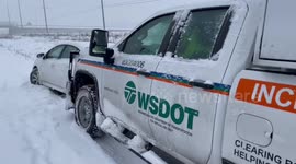 WSDOT Car Pushes Stranded Vehicle Out of Snow in Liberty Lake, WA, USA