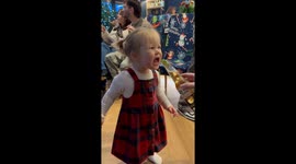 Toddler makes a comical face after trying sour lime slice *Hilarious*