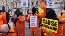 UK activists march through London demanding the closure of Guantanamo Bay.